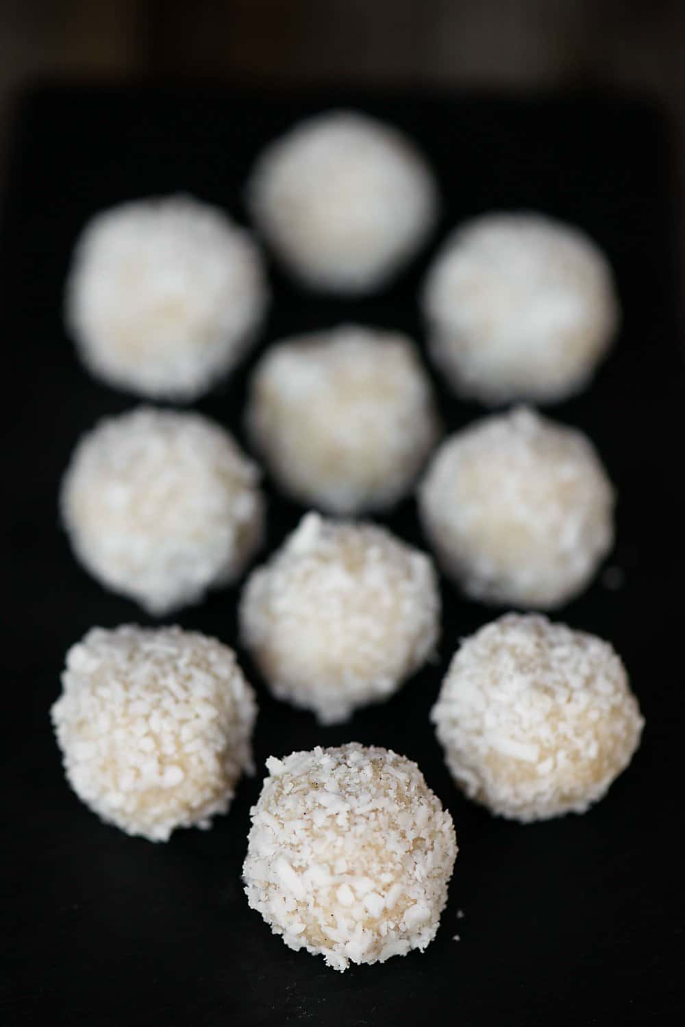 paleo coconut macaroons lined up in rows