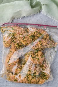 parmesan herb crusted chicken in plastic bag.