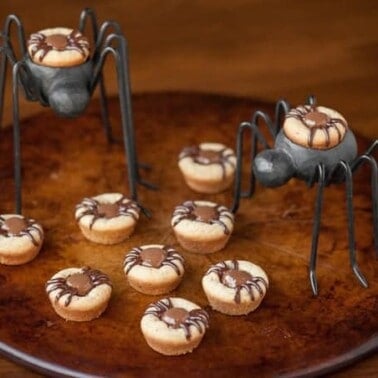 Kids love these Peanut Butter Spider Cookies because they are super fun and easy to make, taste great, and are the perfect Halloween treat.