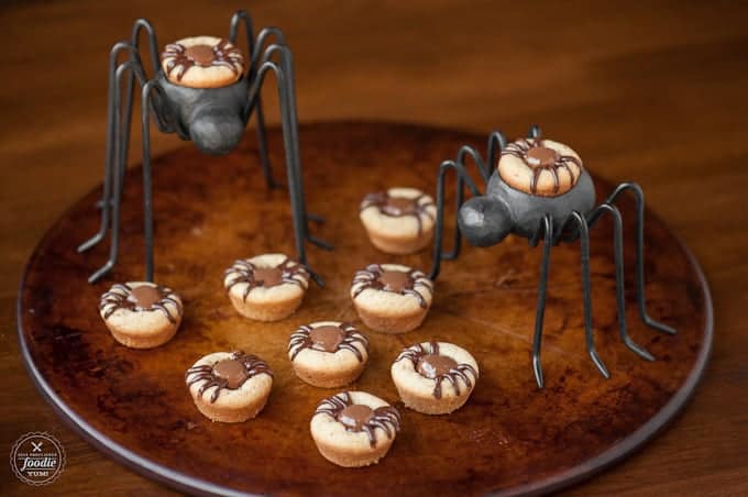 Kids love these Peanut Butter Spider Cookies because they are super fun and easy to make, taste great, and are the perfect Halloween treat.