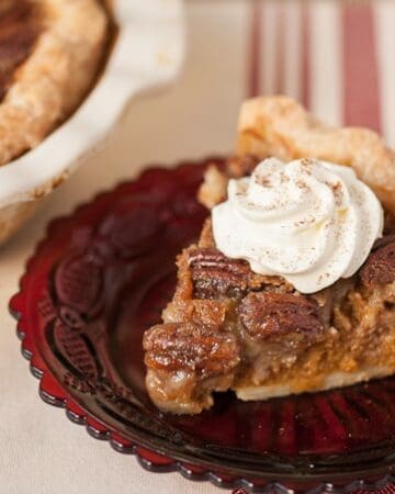 Pecan Pumpkin Pie combines the best of both worlds into one decadent and perfectly sweet holiday pie that is perfect for Thanksgiving Dinner.