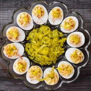 tray of deviled eggs with pepperoncinis