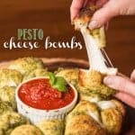 Ooey gooey melty Pesto Cheese Bombs with marinara sauce are super easy to make and will please any crowd. Make this appetizer for your next game day party!