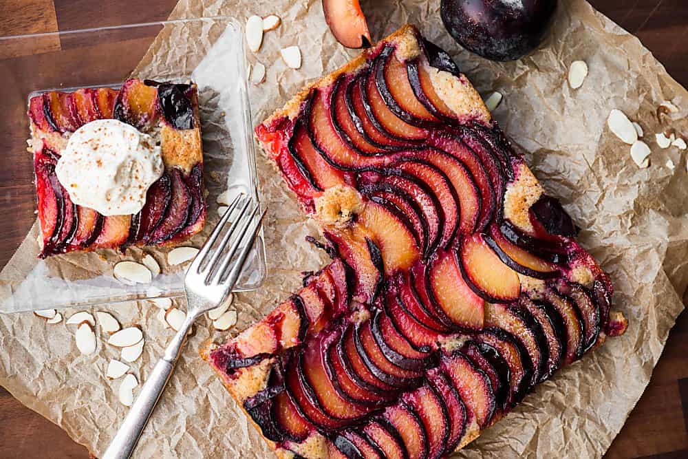 A close up of Plum and Cake on a table