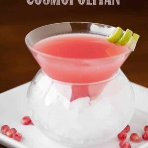 a pink pomegranate Cosmopolitan with vodka in glass