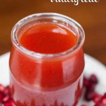 pomegranate vinaigrette in a glass
