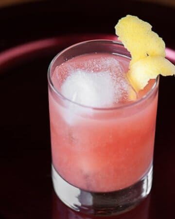 If you want a lip smacking cocktail that’s perfect for the winter holidays, mix up an easy to make Pomegranate Whiskey Sour.