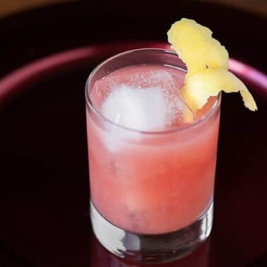If you want a lip smacking cocktail that’s perfect for the winter holidays, mix up an easy to make Pomegranate Whiskey Sour.