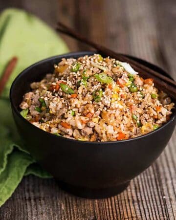 Pork Fried Rice, made with tender pork tenderloin, is a delicious and complete meal your family will love. See how easy it is to make pork fried rice just like a Chinese restaurant in your own kitchen!