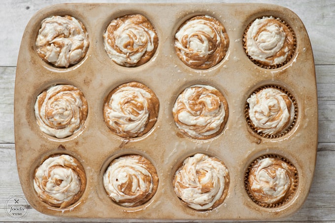 pumpkin cheesecake muffins in a pan