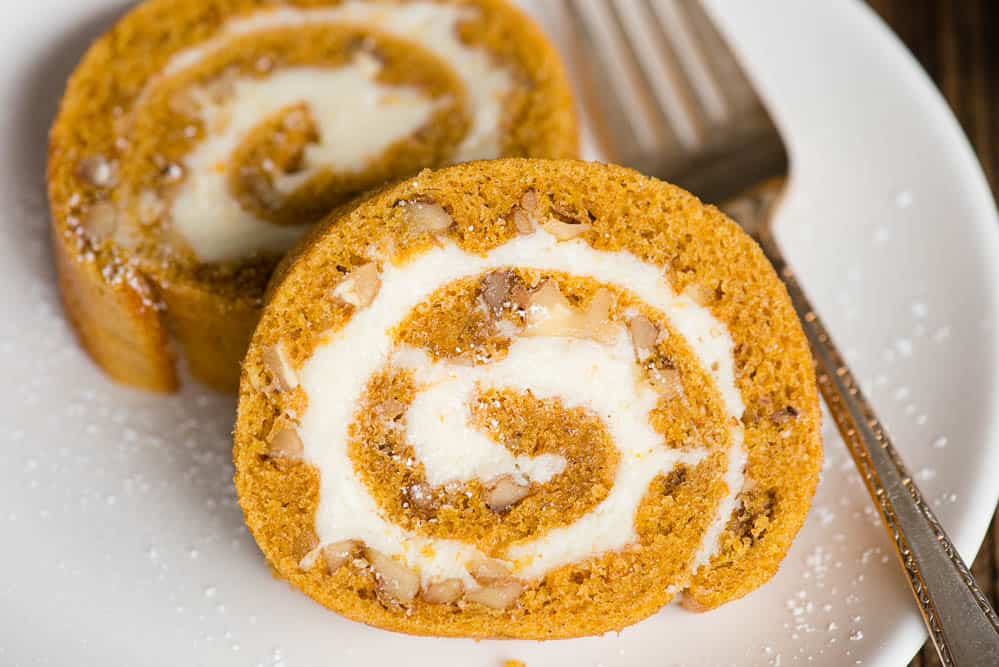 one slice of Pumpkin Roll with cream cheese filling