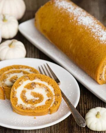 two slices of Pumpkin cream cheese Roll on white plate