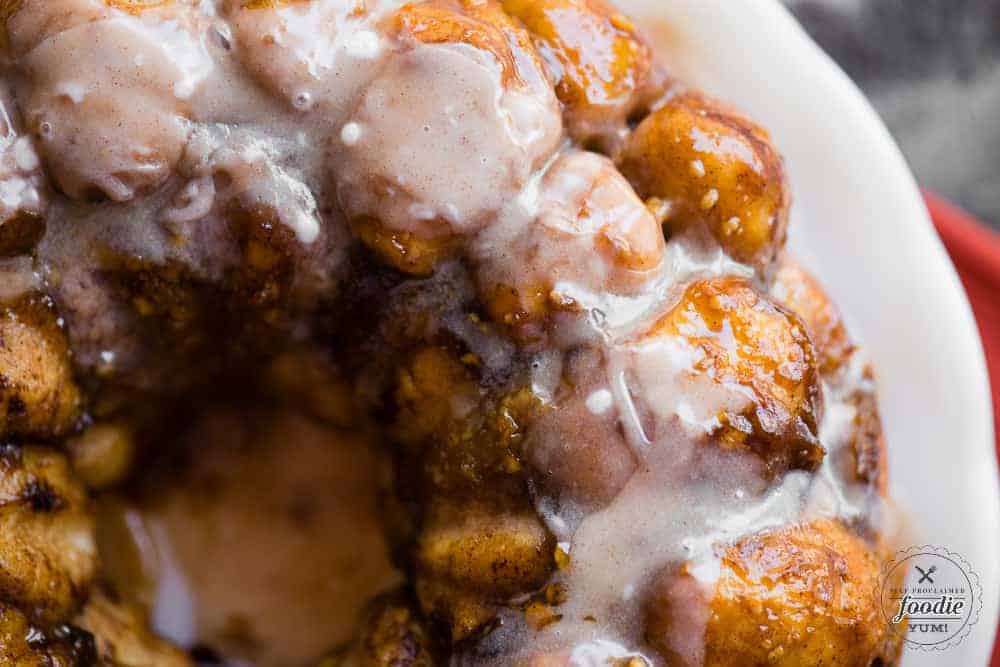 pieces of pumpkin monkey bread with glaze made from scratch