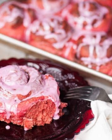 Red Velvet {Beet} Cinnamon Rolls are a super soft and naturally dark pink breakfast pastry that are perfect for a Valentine's Day breakfast.