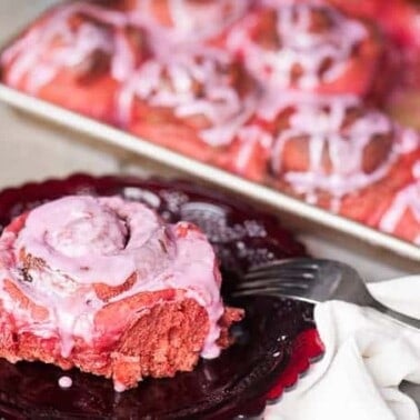 Red Velvet {Beet} Cinnamon Rolls are a super soft and naturally dark pink breakfast pastry that are perfect for a Valentine's Day breakfast.