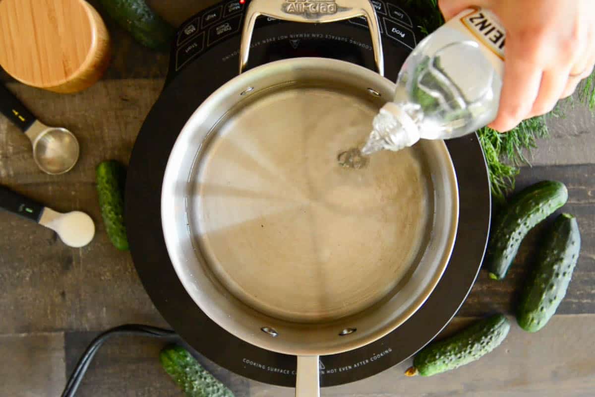 heating vinegar, water, salt, sugar for pickling brine.