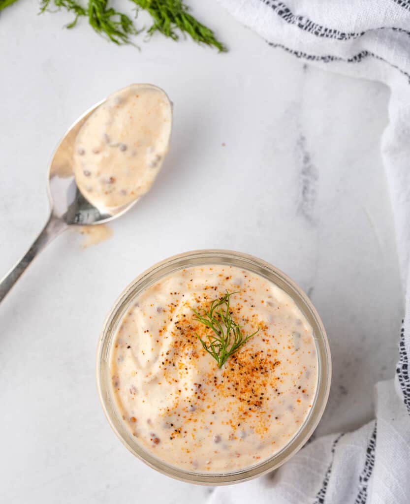 homemade remoulade sauce with spoon.