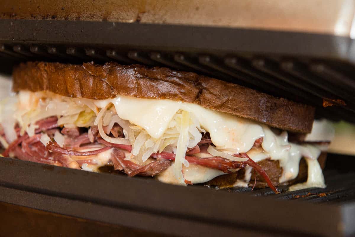 Reuben Sandwich in press with melted cheese