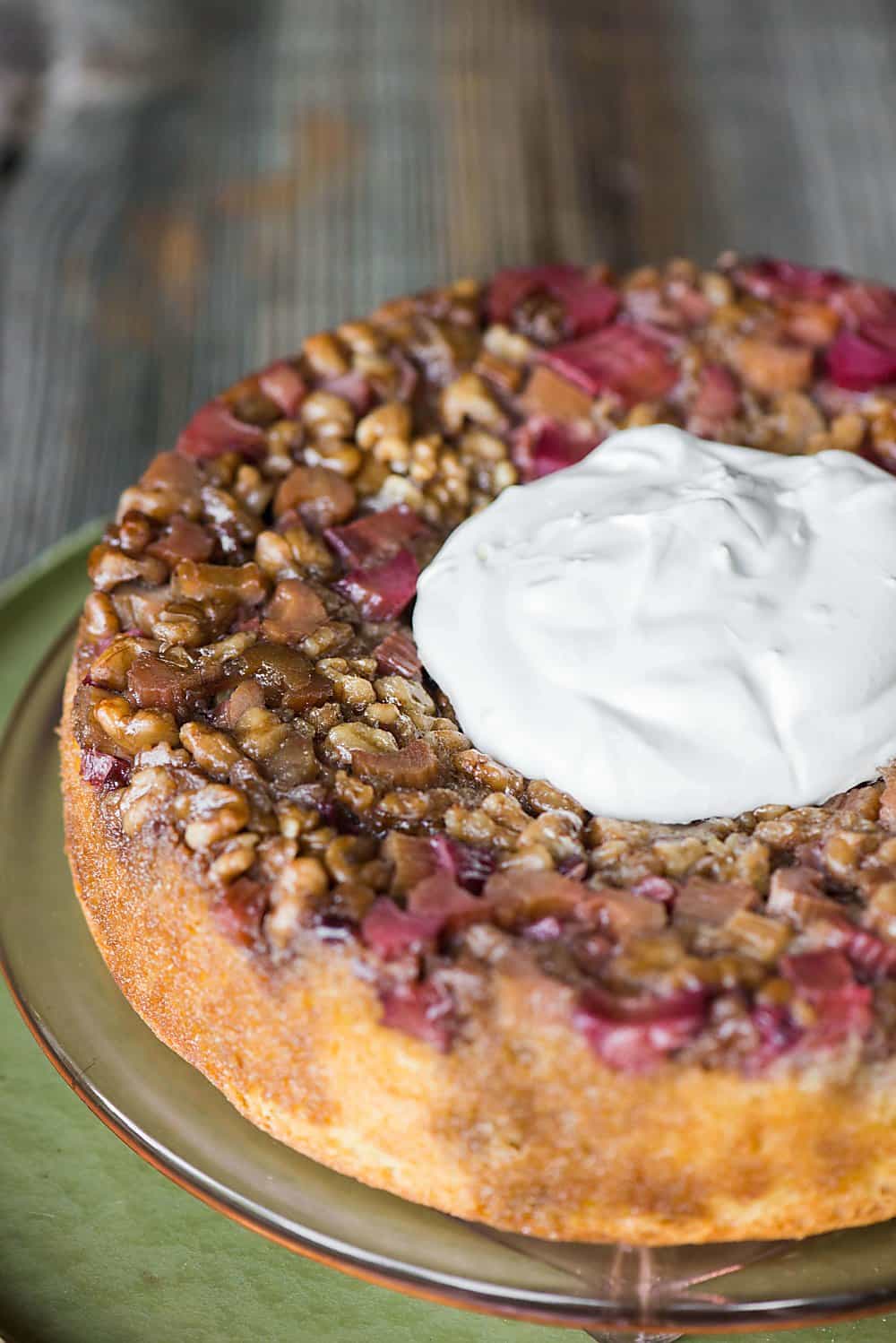 A close up of a rhubarb walnut cake