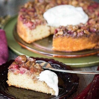 Upside Down Rhubarb Walnut Cake is a heavenly summer dessert made perfect with a moist cake topped with a sweet and tart crunchy fruit topping.