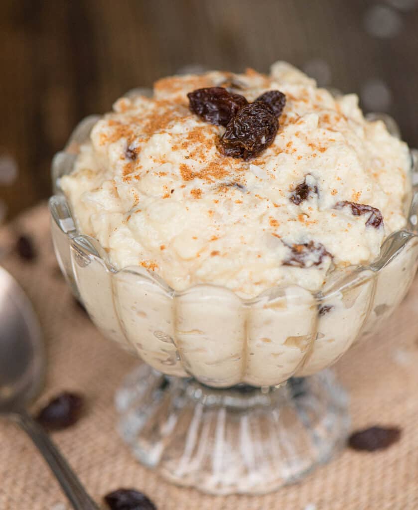 rice pudding with raisins in glass dish