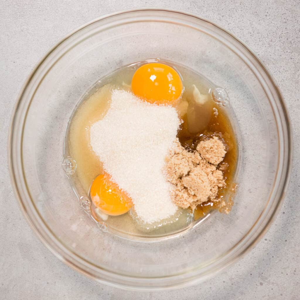 glass bowl with eggs and sugar
