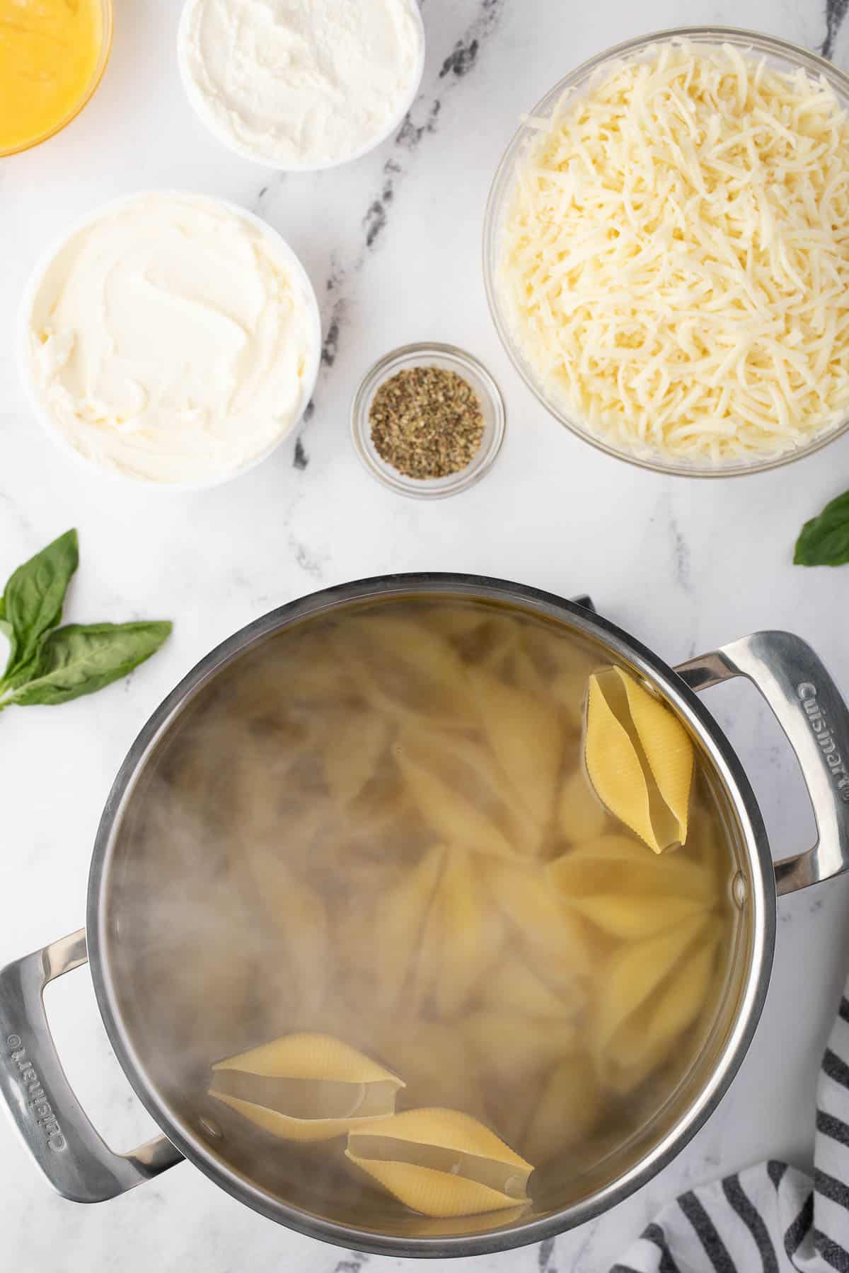 boiling pasta shells in water