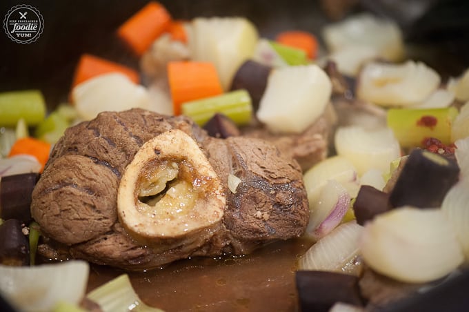 roasted beef bone with vegetables for beef stock