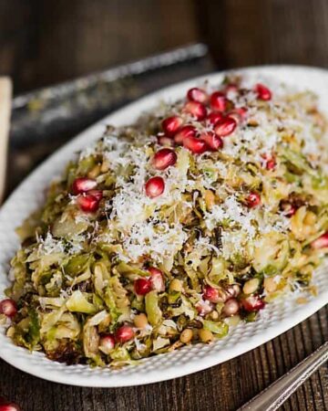 Roasted Brussels Sprouts Salad with parmesan, pomegranate, and a light lemon vinaigrette, is the perfect salad for any holiday or family dinner.