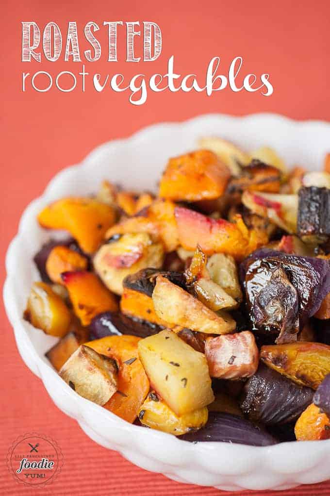 roasted root vegetables in a white bowl