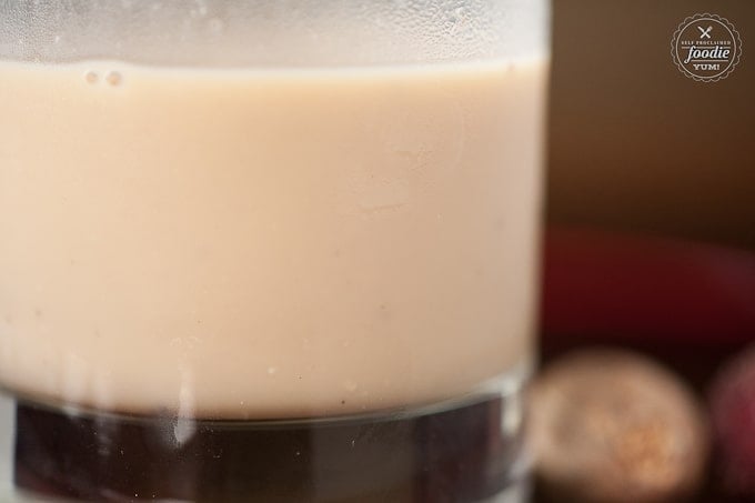 A close up of an eggnog cocktail