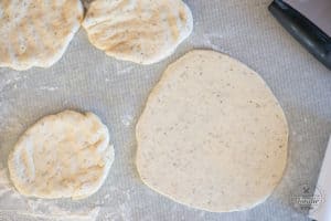 garlic herb flatbread that has been rolled