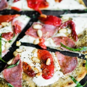 flatbread pizza with roasted red peppers salami and cheese