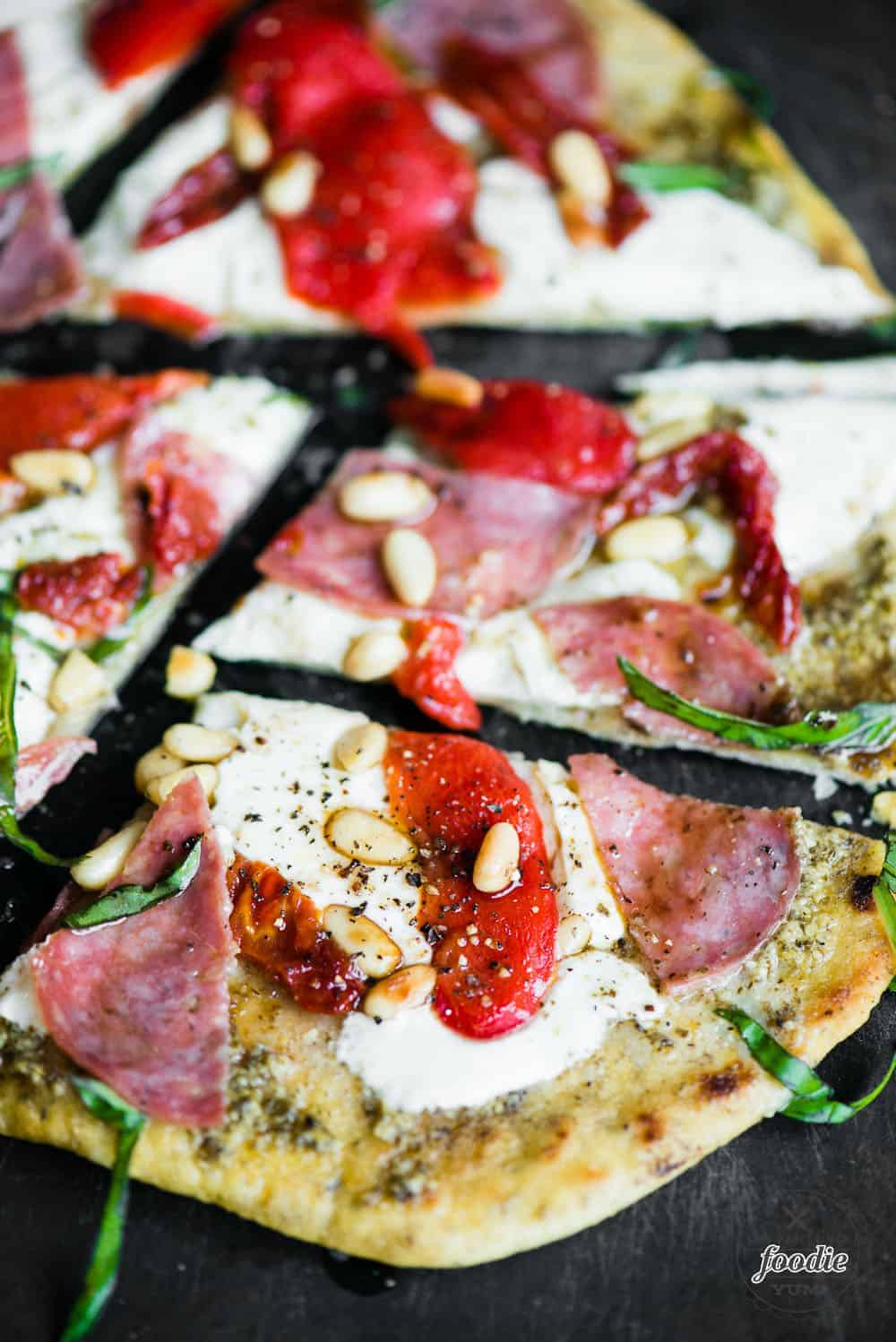 flatbread pizza with roasted red peppers salami and cheese