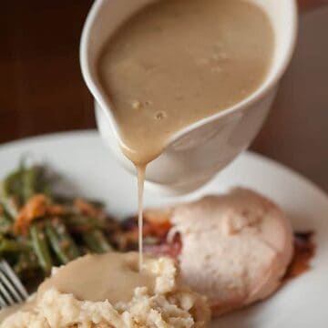 Savory Herb Turkey Gravy is the absolute best homemade turkey gravy from turkey drippings that you can serve with your Thanksgiving dinner.