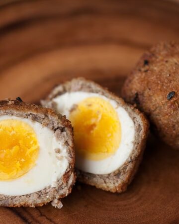 Scottish Eggs are a delicious take on breakfast. Egg wrapped in sage breakfast sausage, then dipped in egg, and then fried? Yes please.