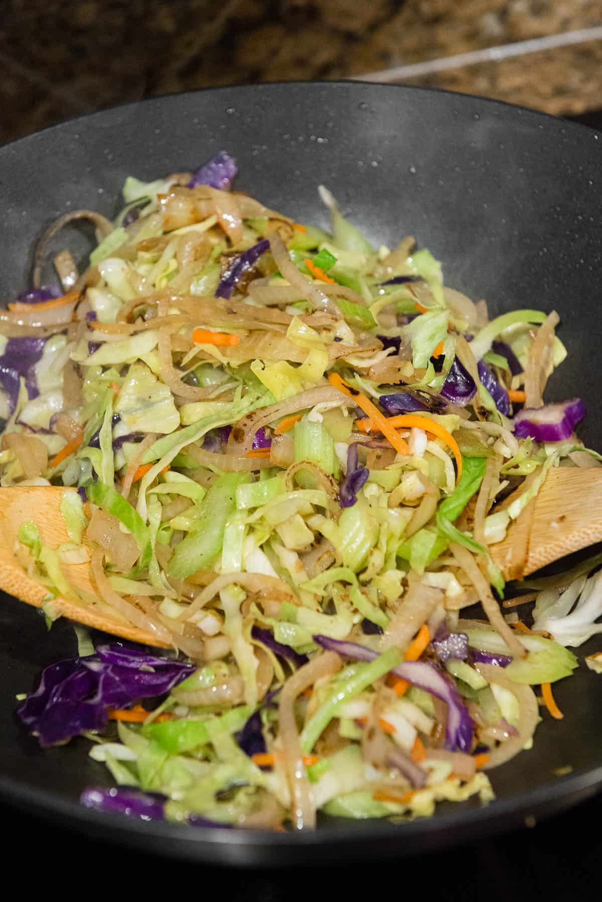cabbage, onions, in celery stir fry in wok