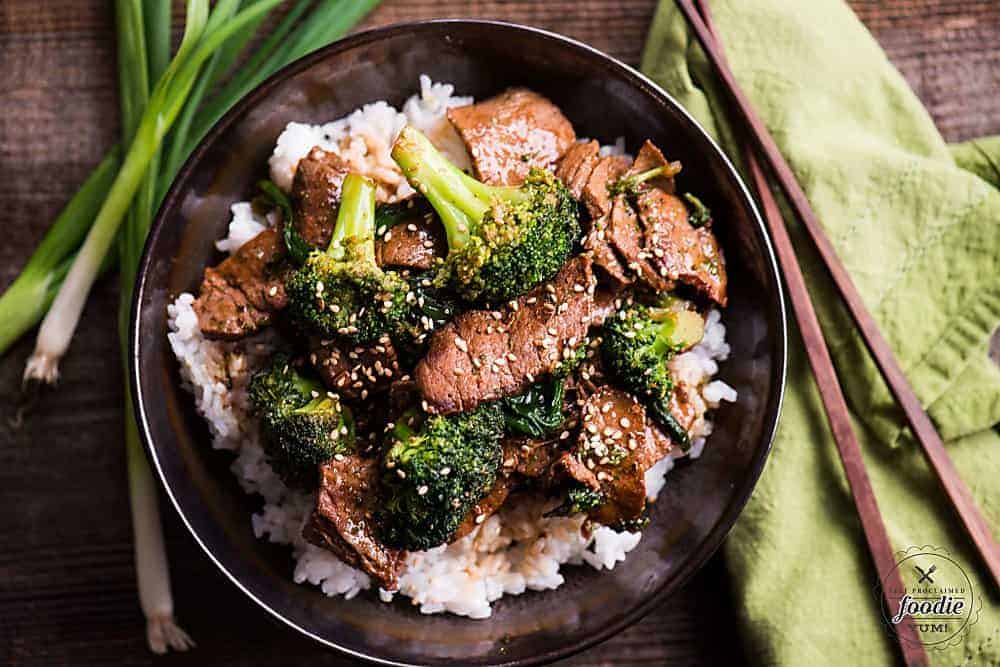 bowl of broccoli and beef over rice
