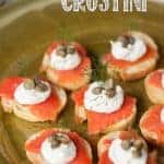 smoked salmon crostini on a brown dish