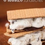 These delicious S'mores Ice Cream Sandwiches are made with chocolate covered graham crackers & homemade no churn vanilla and marshmallow swirl ice cream.