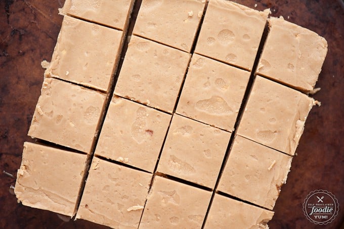 Pan of peanut butter fudge cut into 16 squares