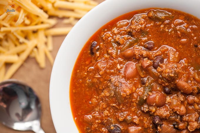 homemade southwestern chili with shredded cheese