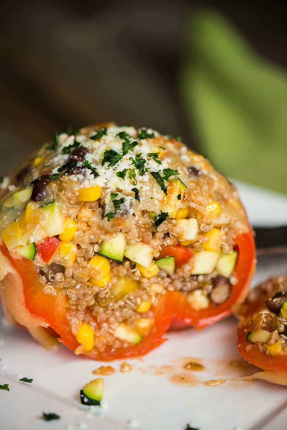 Southwestern Quinoa Stuffed Peppers are a flavorful and fantastic choice if you're searching for healthy vegetarian stuffed peppers without rice.