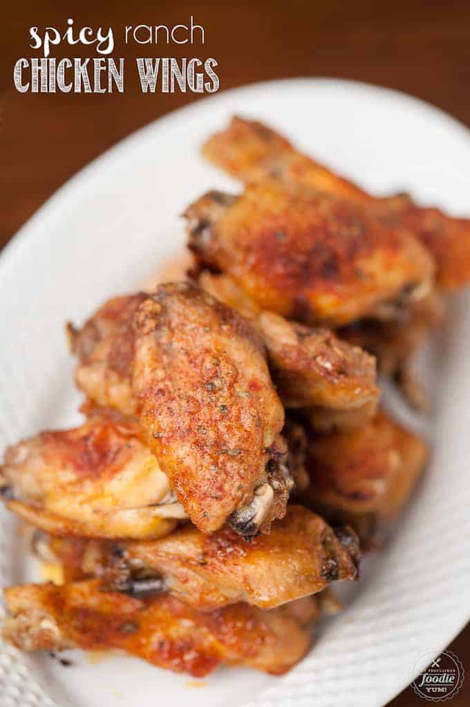baked chicken wings on white oval plate