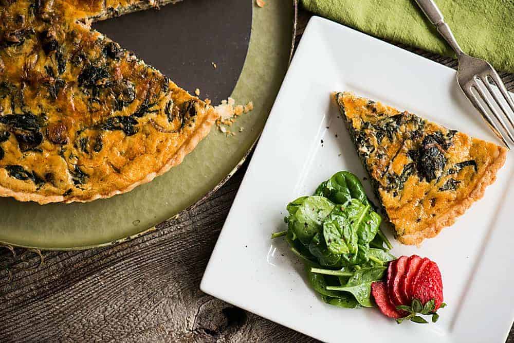 Breakfast quiche with spinach and mushrooms