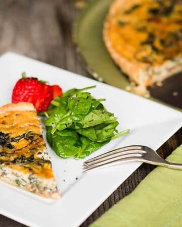Mushroom Spinach Quiche is a rich and savory meal baked in an all butter pie crust. This homemade quiche recipe is perfect as breakfast or lunch when served with lightly dressed greens.