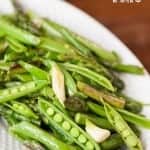 This Spring Vegetable Trio is a quick and delicious saute of fresh asparagus, garlic spears, and sugar snap peas that makes an easy to prepare side dish.