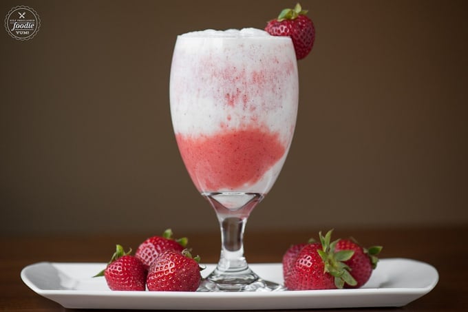 side view of strawberry coconut lava flow in glass