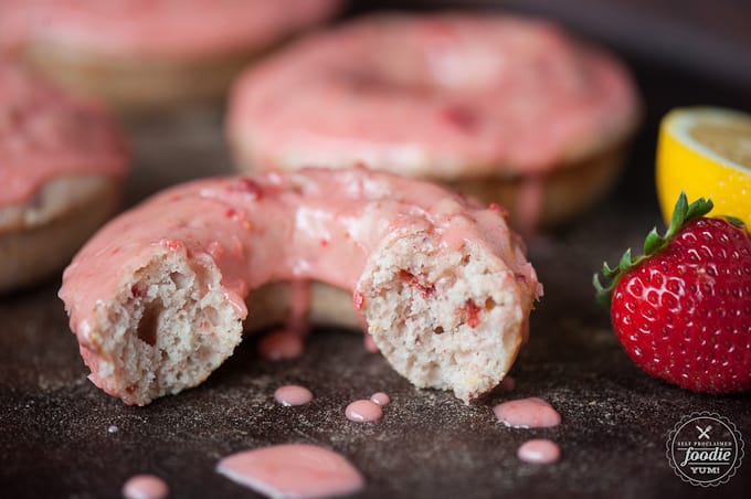 A close up of a baked donut split in half