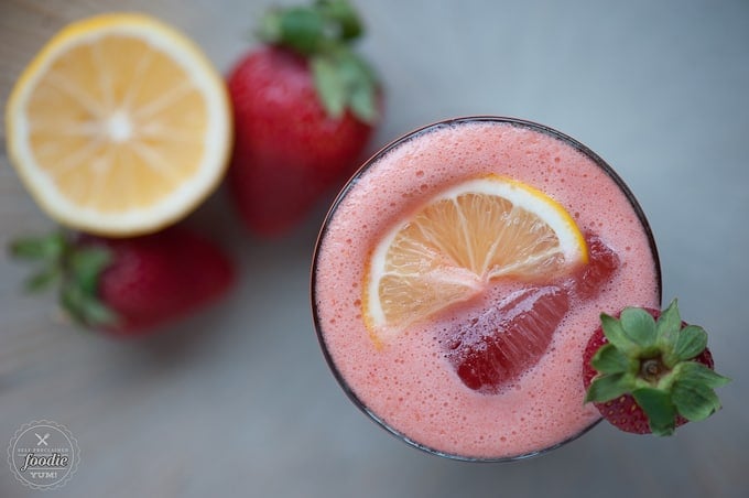 Whiskey Sour made with strawberry and lemon